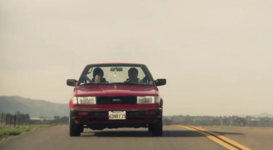 Michael and Andy at the start of their road trip, in Michael’s car