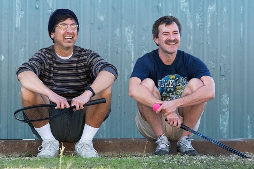 Michael and Andy sat down after a game of Paddleton